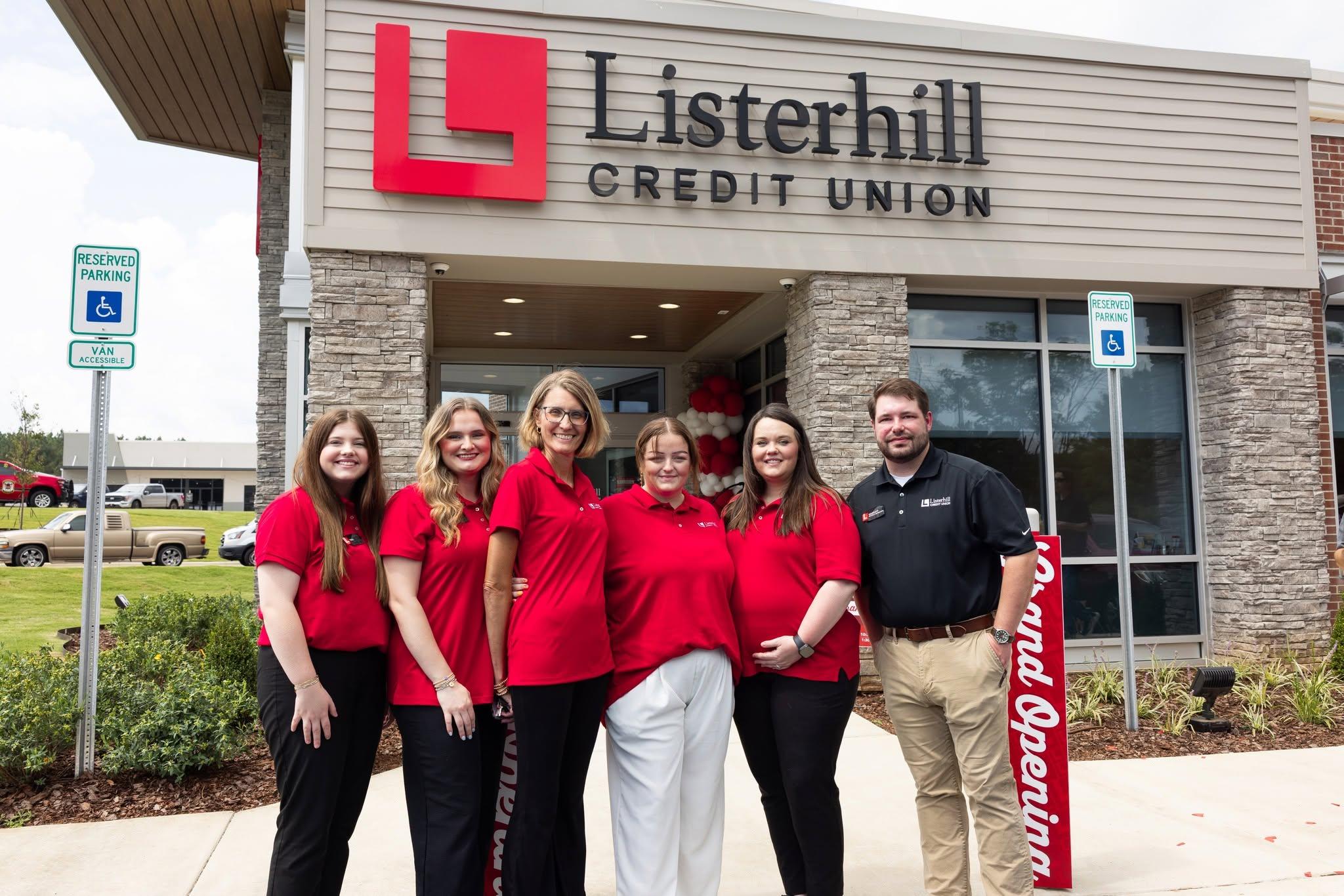 Listerhill Credit Union's Winfield Branch pose for a group photo in front of the new Winfield branch facility which opened Jun 22.