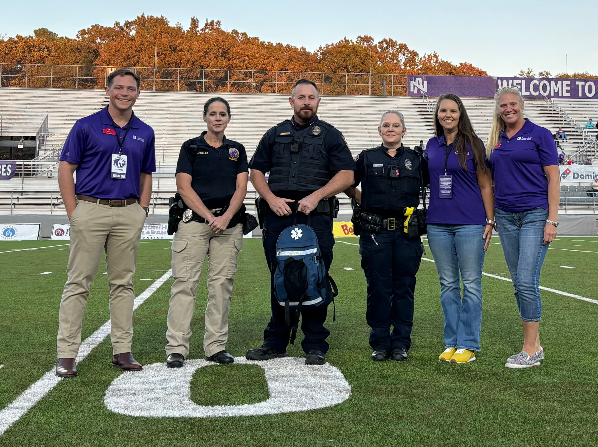 Listerhill employees donating AED to UNA PD