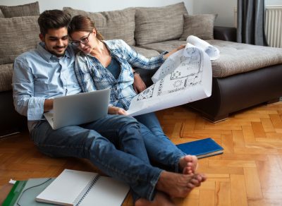 Couple Looking at Home Blueprints