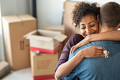 Unpacking Boxes And Hugging