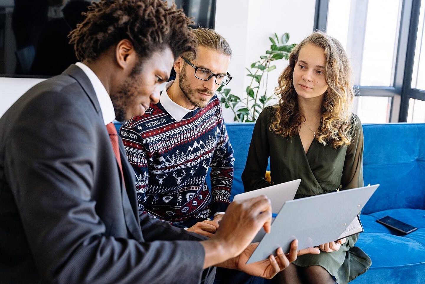 Couple Discussing Loan with Professional