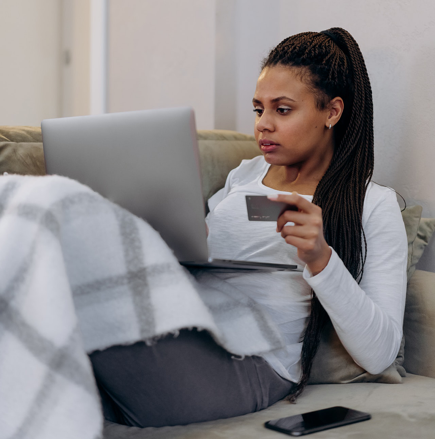 Woman Using Credit Card on Computer